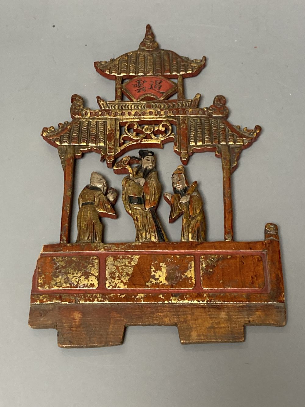 A group of Chinese lacquered wood carvings, tallest 40cm